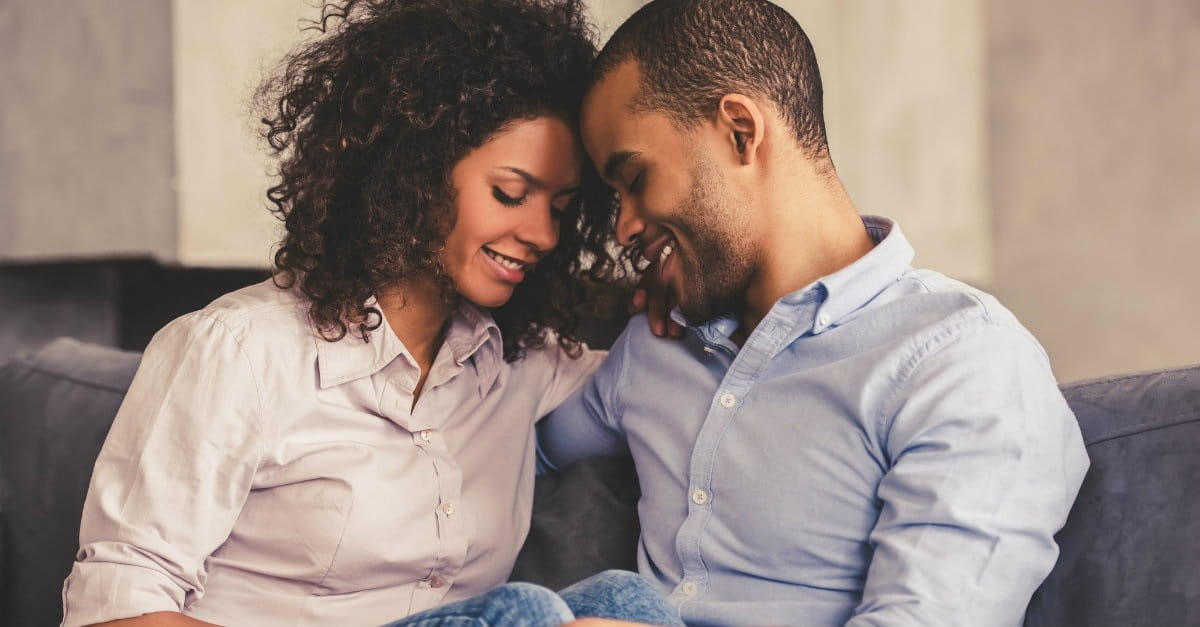 1609-47714-cuddling-couple-on-couch-12001200wtn